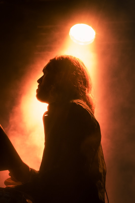 Silhouetted Musician On Stage