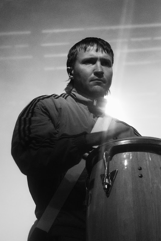 Man Playing Conga Drum